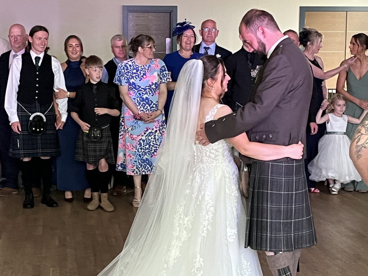 Premier disco weddings bride and groom katie and ryan sharing their first dance at meldrum house hotel